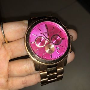 Michael Kors watch hot pink face &rose gold band.
